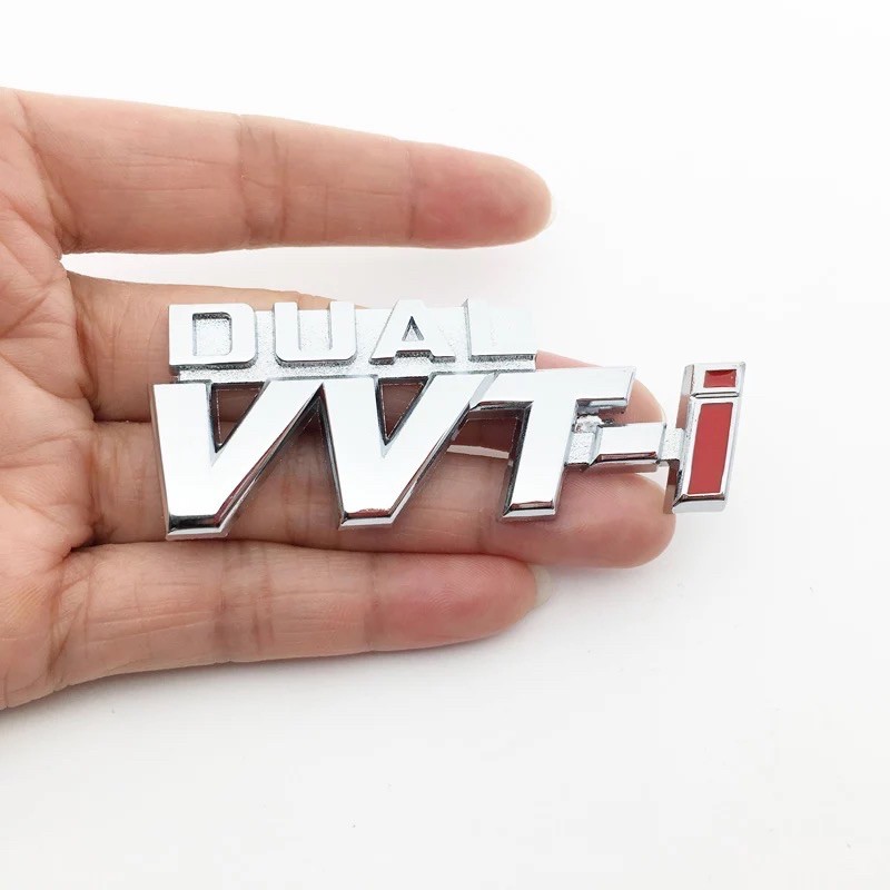 Logo chữ nổi DUAL VVT-I VVTI kích thước 2.7cm*7cm dán thân xe