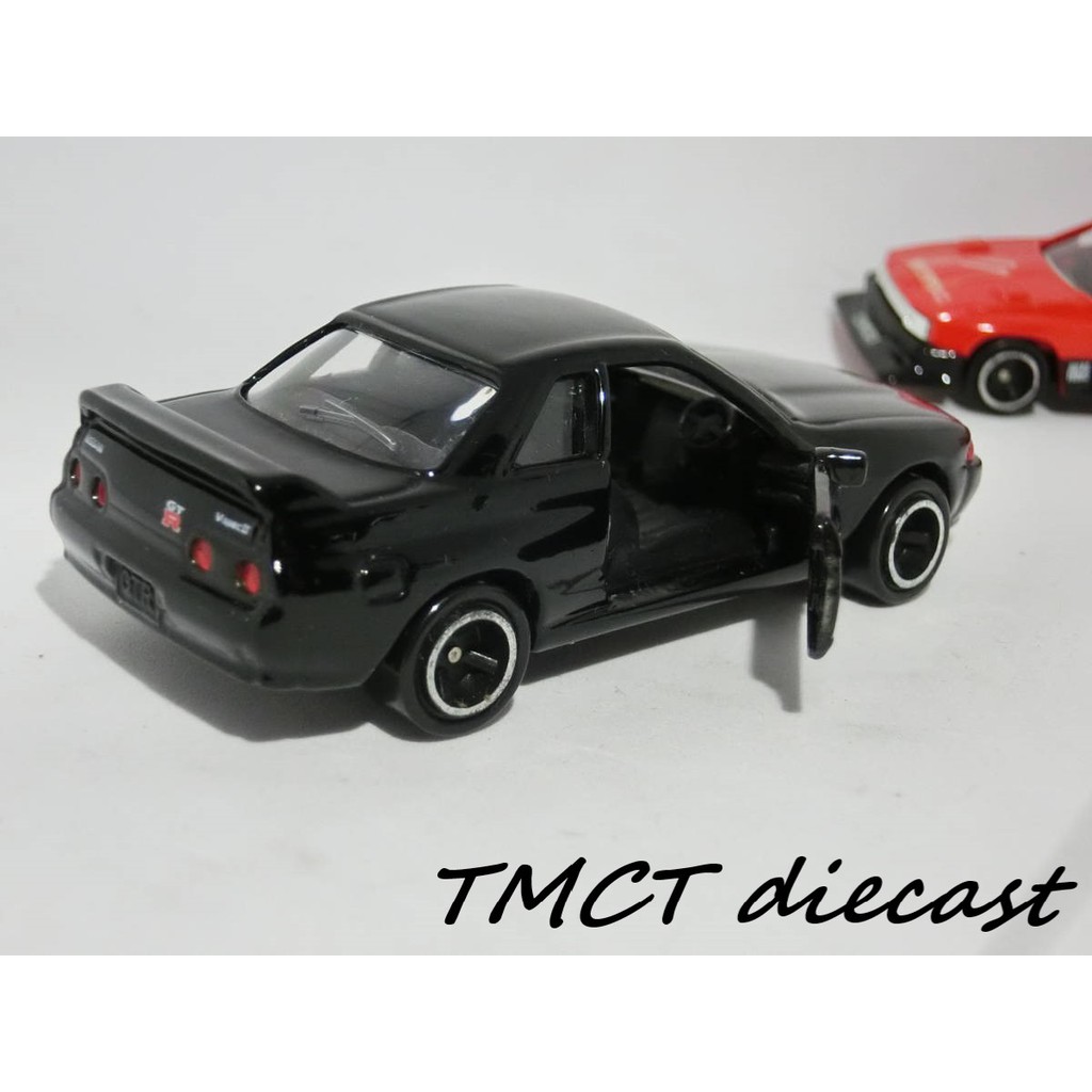 Mô hình 1/64 Tomica Nissan Skyline GT-R No.20 1999 (có gương - đèn nhựa) - Skyline Silhouette Formula Made in China