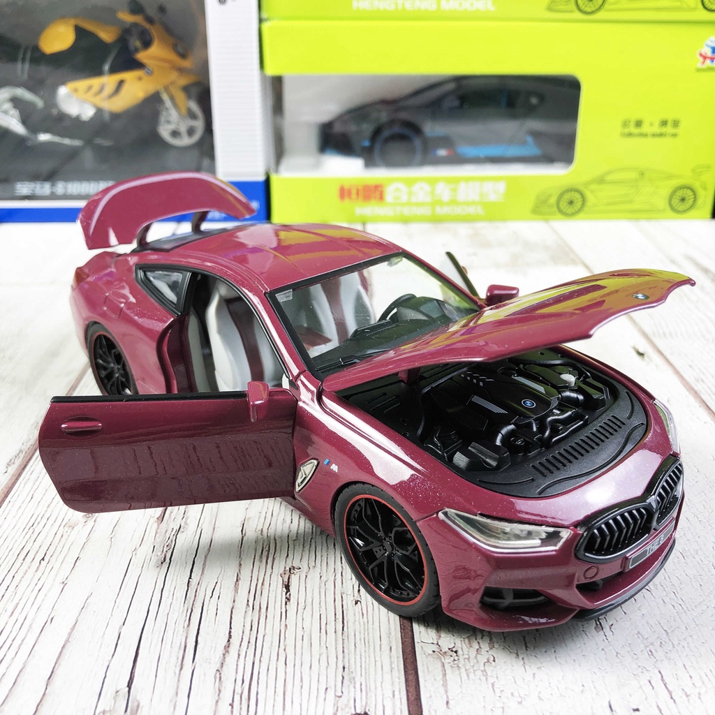 Mô hình tĩnh hợp kim tỉ lệ 1:24 BMW 840i Gran Coupe hãng Hengtang Model có 2 cửa, nắp capo và cốp sau mở được