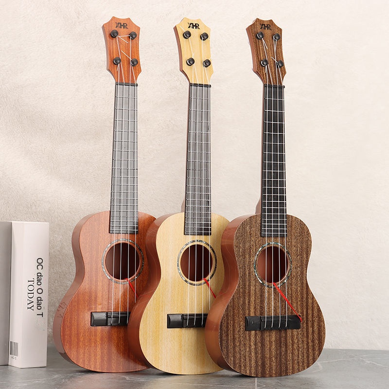 Đồ chơi sinh nhật cho bé gái mới tập chơi ukulele có thể chơi được cho người mới bắt đầu Đồ chơi mô phỏng dành cho trẻ e