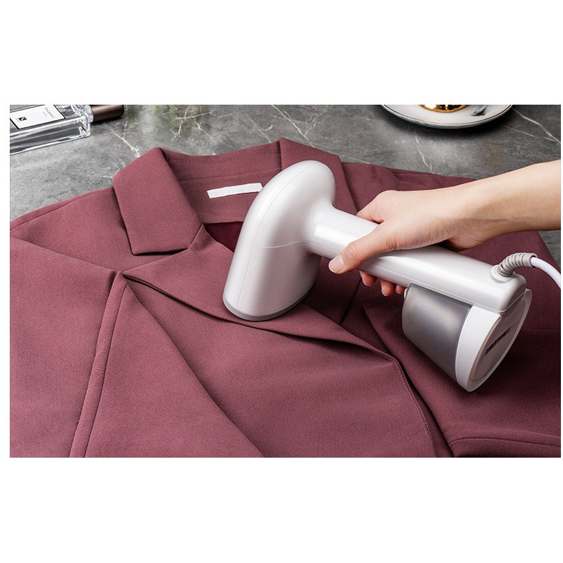 Bàn là hơi nước cầm tay Haier