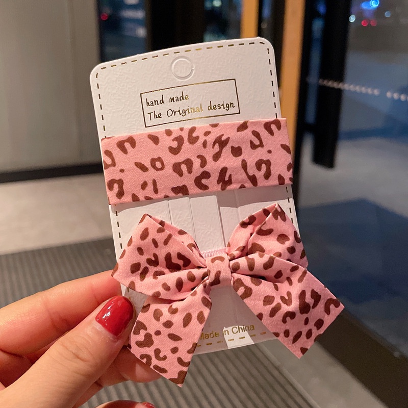 Kẹp tóc hình nơ họa tiết da báo phong cách retro dành cho nữ