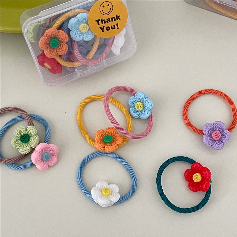 Hộp 7 chiếc cột tóc hoa nhựa nhiều màu cho bé