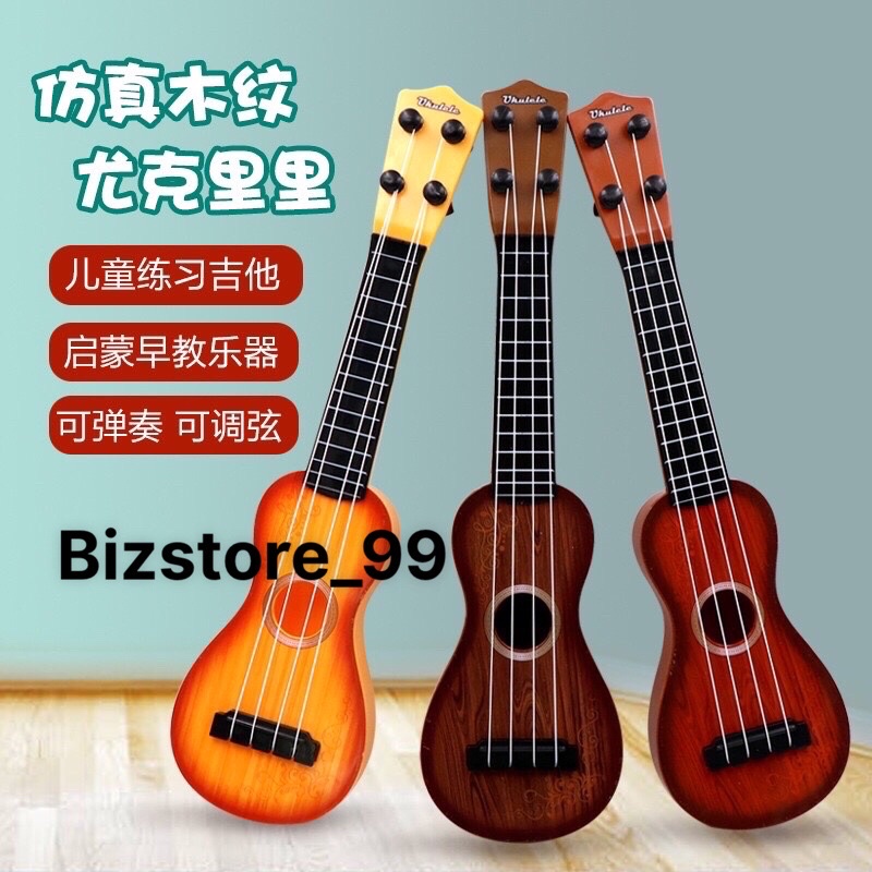 Đan guitar bằng nhựa cao cấp cho bé