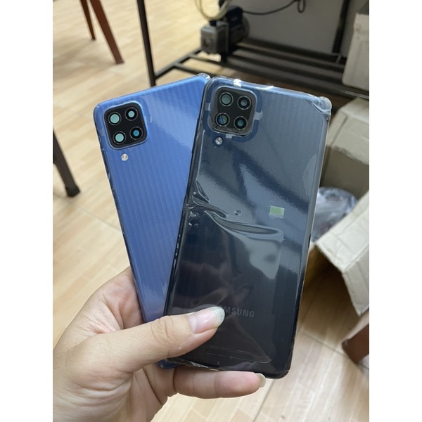 Nắp lưng vỏ điện thoại Samsung M12 zin new hãng