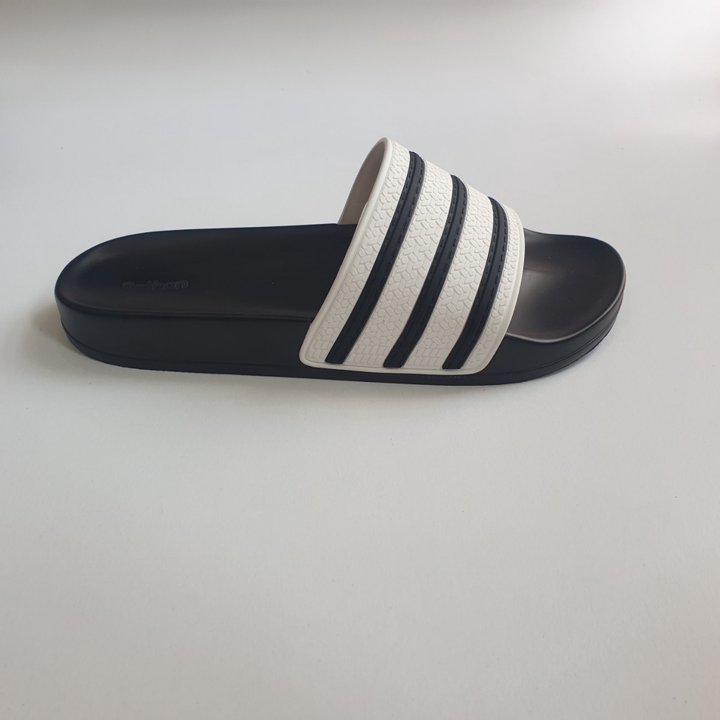 Dép nam nữ quai ngang slipper Pathon quai PVC và đế PU đen quai sọc đen trắng SD38