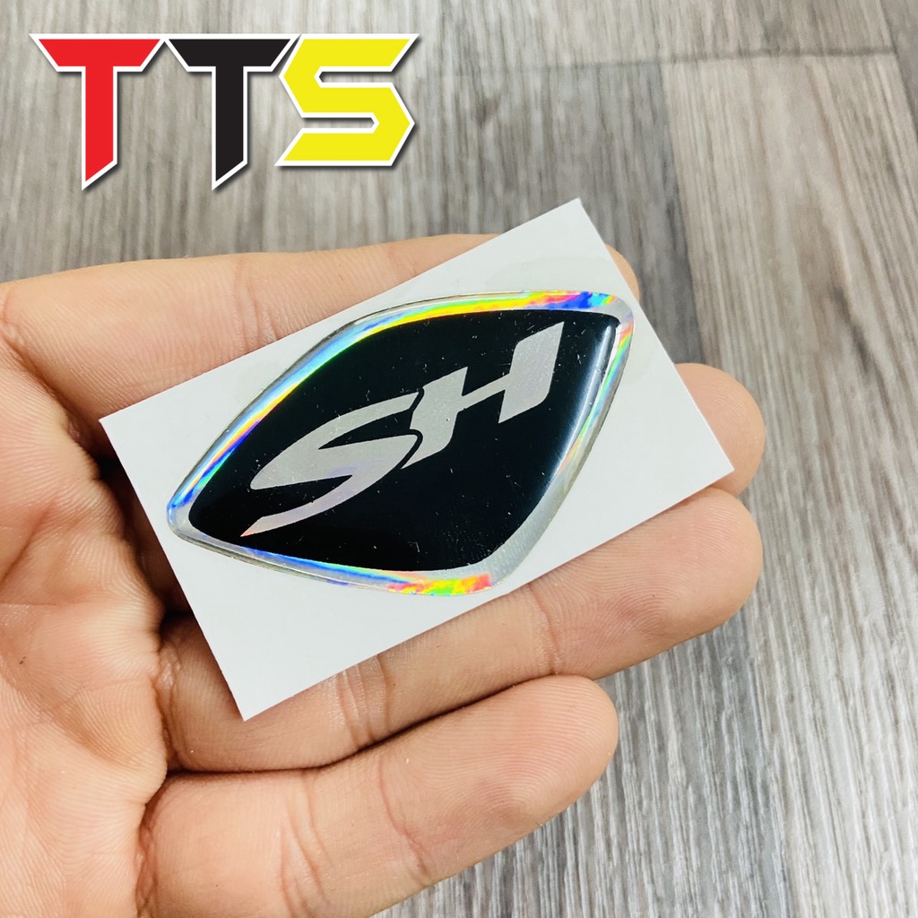 Logo tem chữ SH dán mặt nạ chất liệu nhựa dẻo nổi nhiều màu sắc đẹp mắt