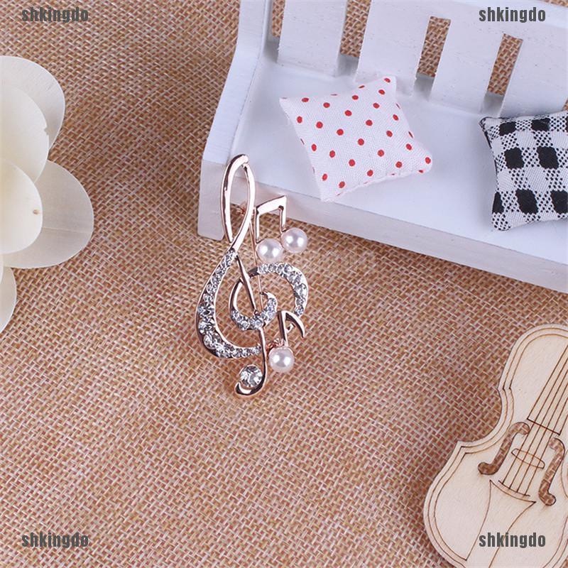 Cài áo hình nốt nhạc đính đá và ngọc trai thanh lịch