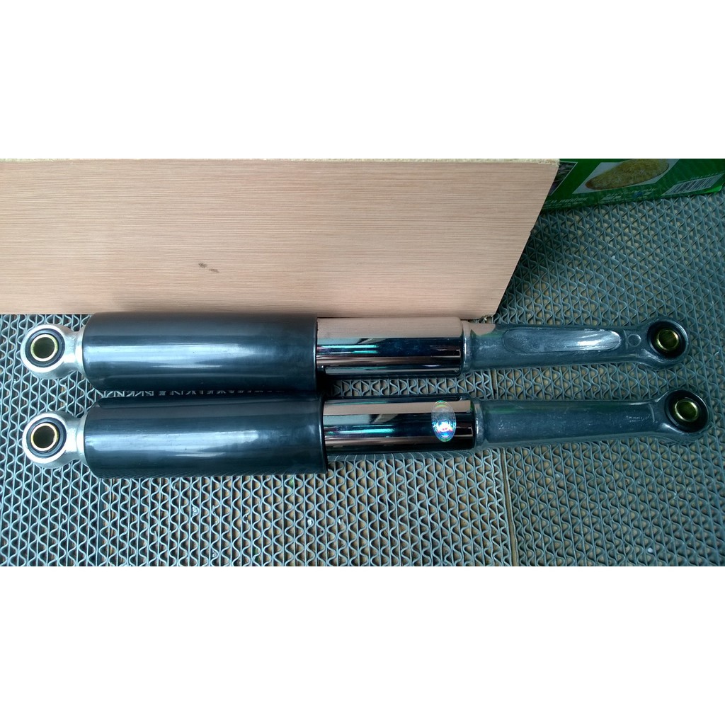 Cặp phuột sau honda 67