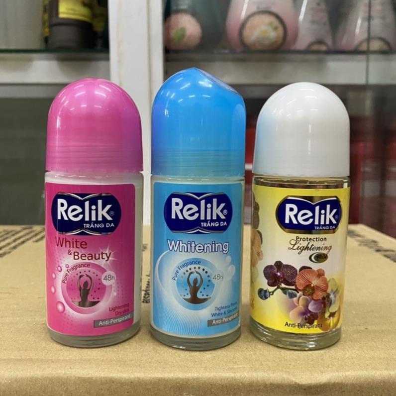 Lăn khử mùi Relik chai lớn 50ml  có 3 màu hồng, xanh và vàng như hình