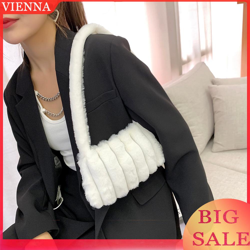 Túi xách kẹp nách vải lông mềm mại họa tiết trái tim phối khóa kéo hợp thời trang