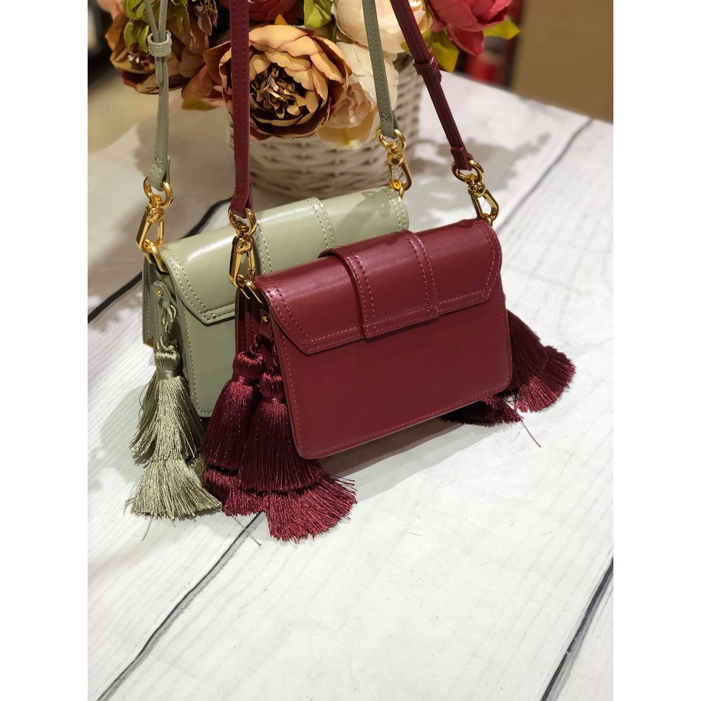 SALE mạnh túi xách tay nữ tua rua xinh xắn CHARLES AND KEITH auth