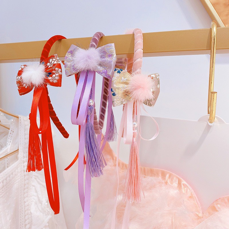 Băng đô phối nơ đáng yêu dành cho bé gái