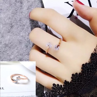 Nhẫn titan ko đEn hai viên đá chéo NT019
