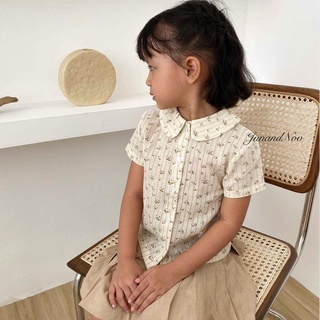 Áo sơ mi bé gái cổ sen hoa nhí, chất liệu thô đũi tưng, cúc thân trước, màu nâu họa tiết hoa nhí vintage JUN&NOV