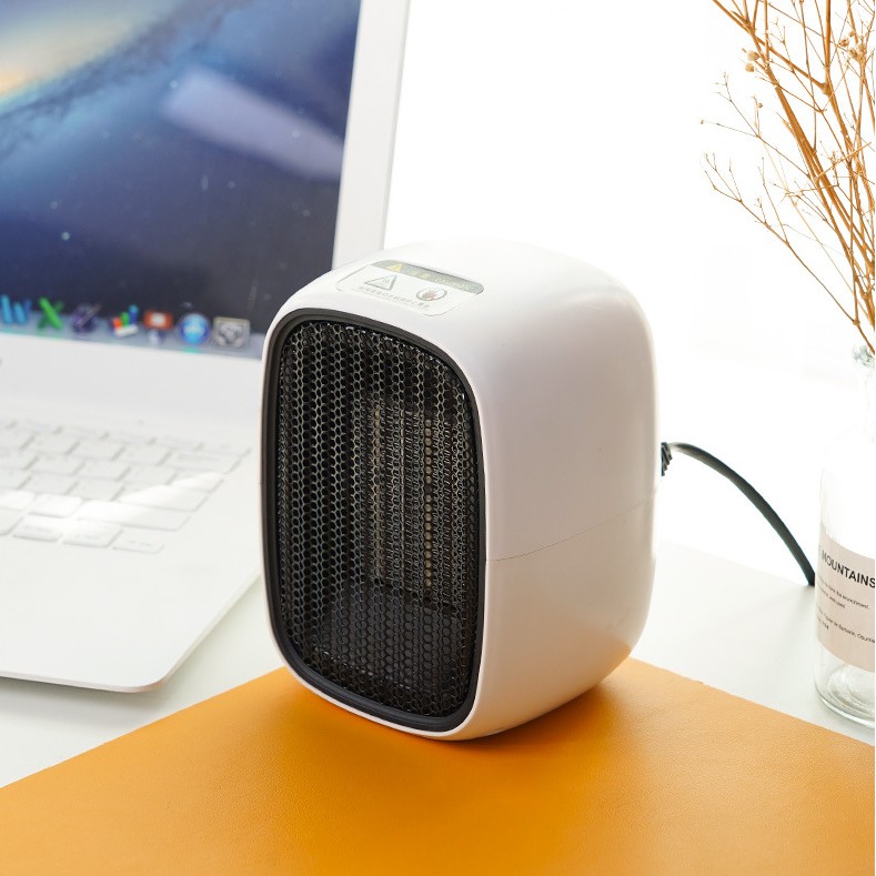 Máy Sưởi Ấm Mini Xách Tay Hoặc Để Bàn Đa Năng Công Suất 500W Dùng Cho Gia Đình Hoặc Văn Phòng Nhỏ