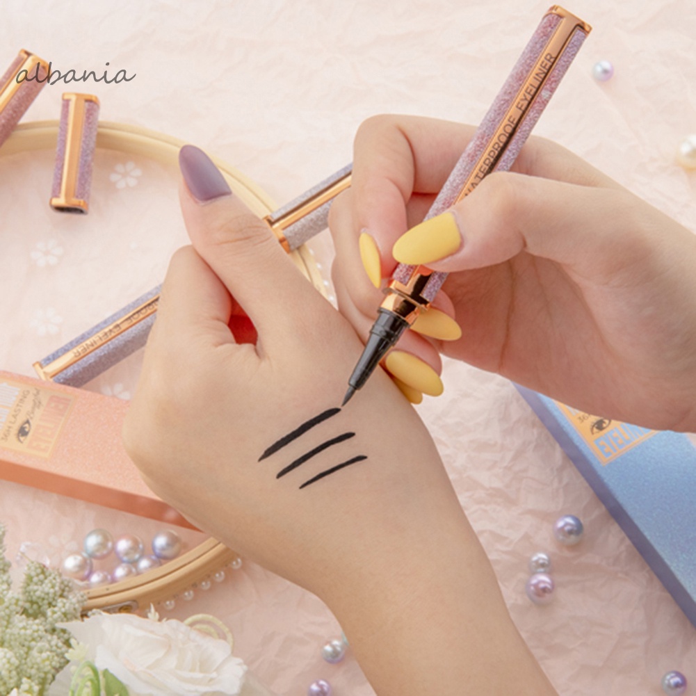 Bút kẻ mắt QIC dạng lỏng chống thấm nước nhanh khô không nhòe | BigBuy360 - bigbuy360.vn