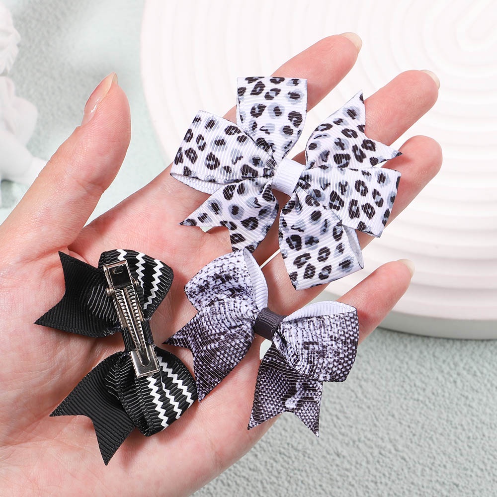 Set 10 kẹp tóc KIDSBOWS đính nơ họa tiết da báo cho bé gái