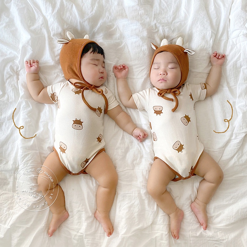 Bộ áo liền quần tay ngắn họa tiết dễ thương dành cho bé từ 0-24 tháng tuổi