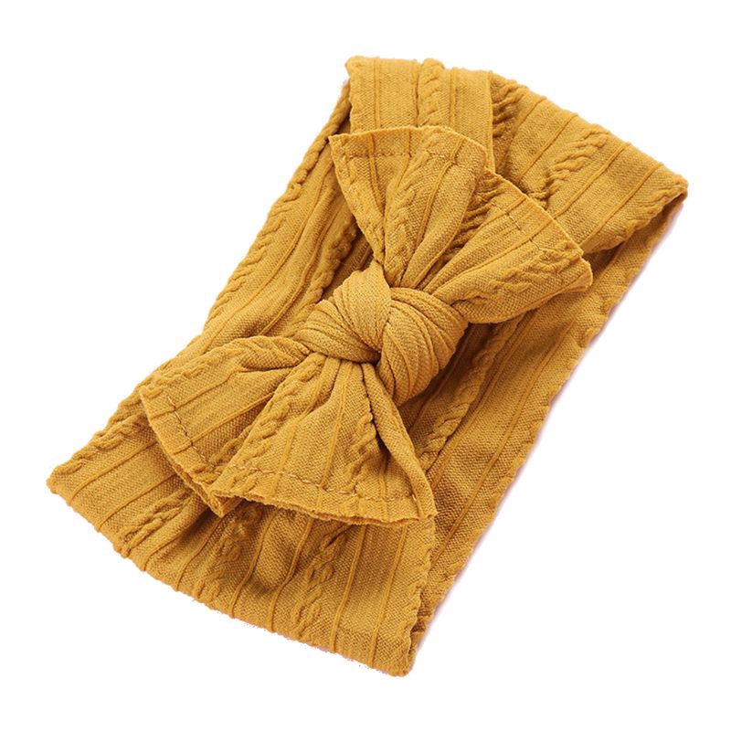 Băng đô len đan đính nơ xinh xắn cho bé gái