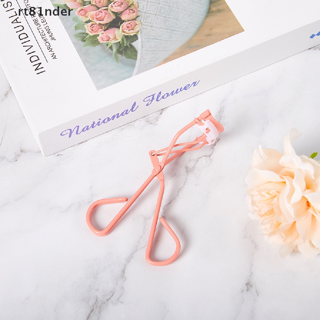 1 Dụng Cụ Bấm Mi Tích Hợp Lược Tiện Dụng