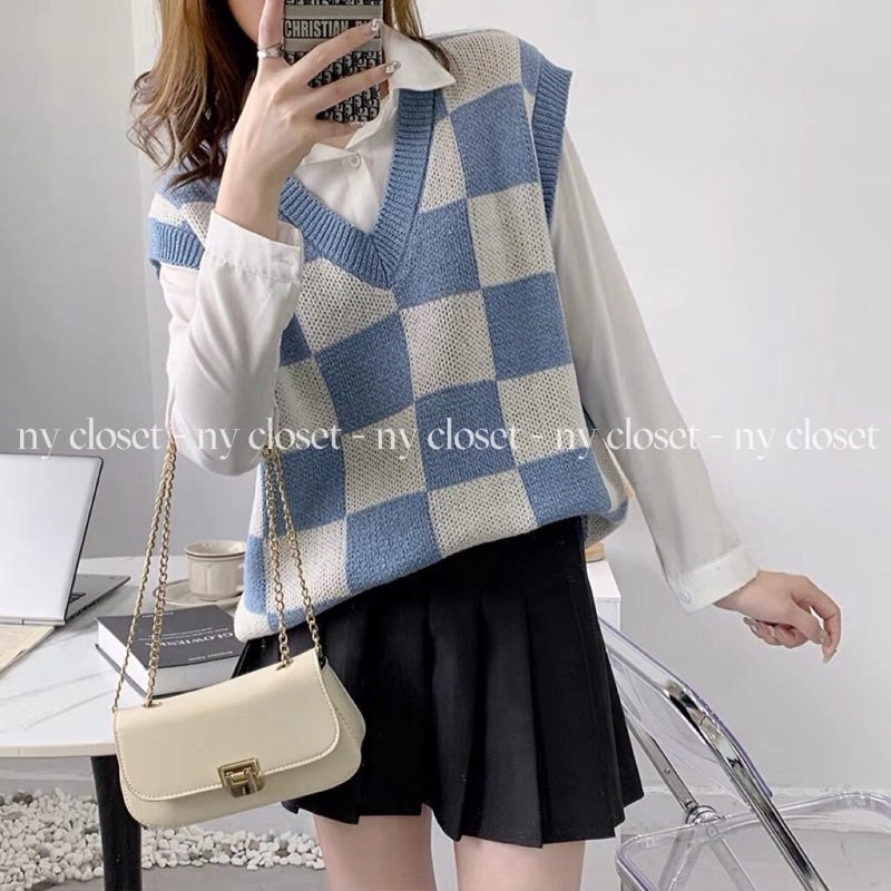 Áo gile len fom dấu quần.