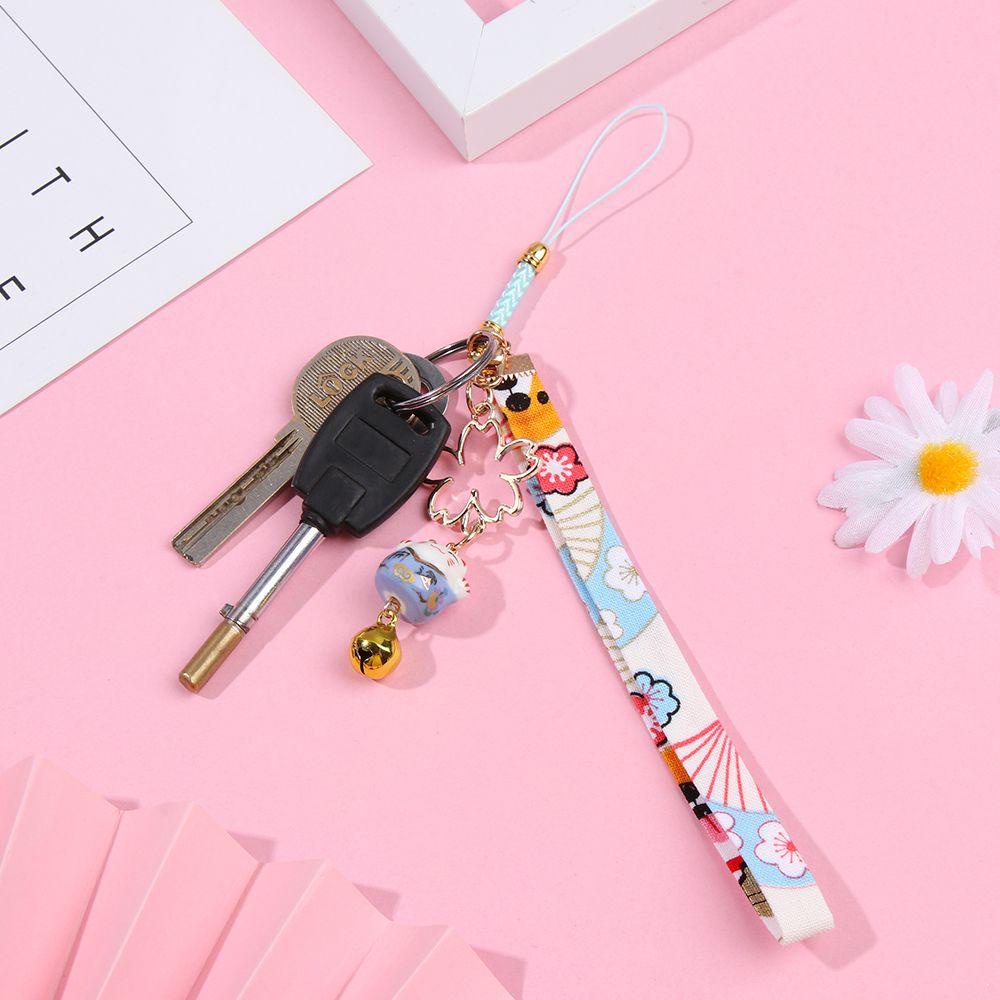 Dây Treo Điện Thoại Hình Mèo May Mắn / Hoa Anh Đào Xinh Xắn Chống Thất Lạc