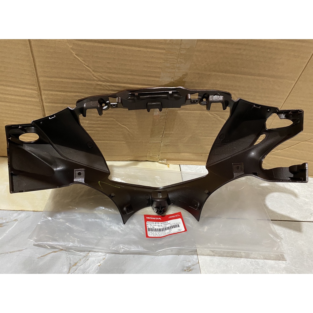 Nắp ốp trước tay lái- bàn thờ HONDA FUTURE 125 năm 2016 màu Nâu. 53210KYZV20ZJ