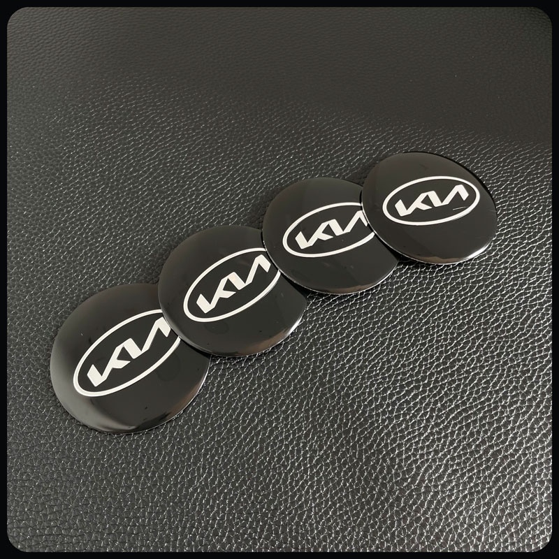 Bộ 4 Miếng Dán Trang Trí Trục Bánh Xe Hơi 56mm In Logo Kia KN K5 K3 KX1 Sorento Sportage Rio Soul