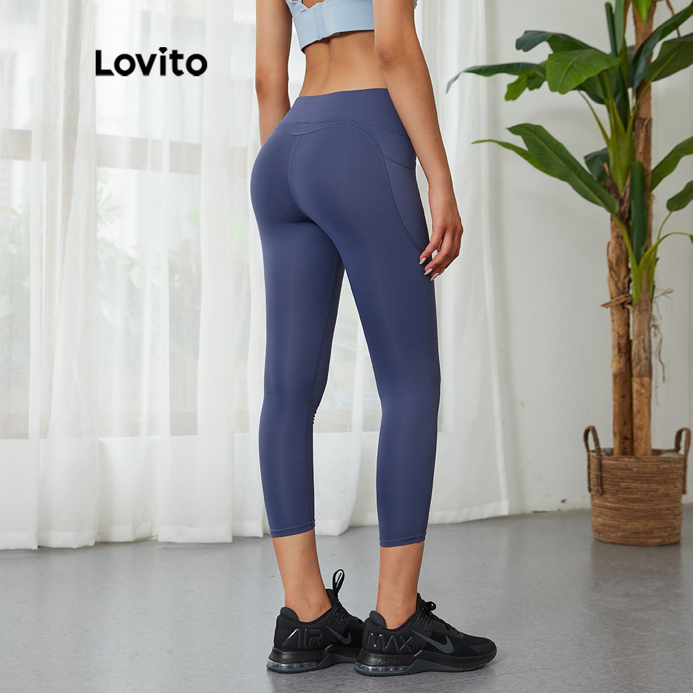 Quần legging thể thao LOVITO L03052 nhanh khô ôm dáng có túi màu xanh lá/ đen/ xanh dương đậm | BigBuy360 - bigbuy360.vn