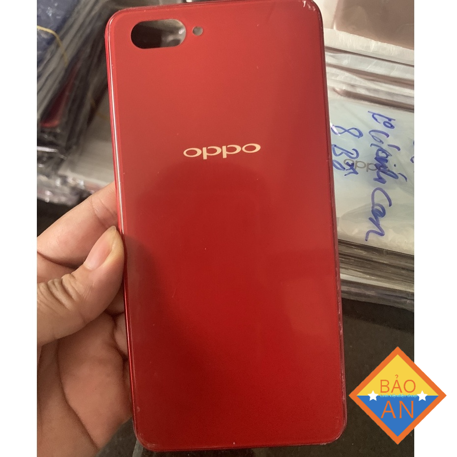 lưng oppo A3S - 32g ( lỗ tróc sim trên ) gồm lưng ,kính cam ,nút bấn