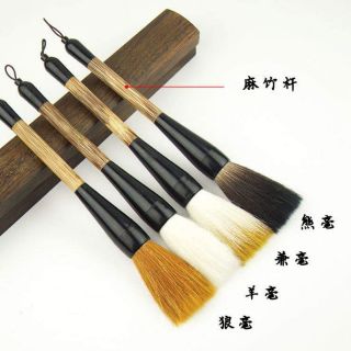 Bút lông viết câu đối, đại tự