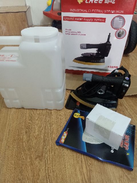 Bàn là hơi công nghiệp,củ bơm tự động