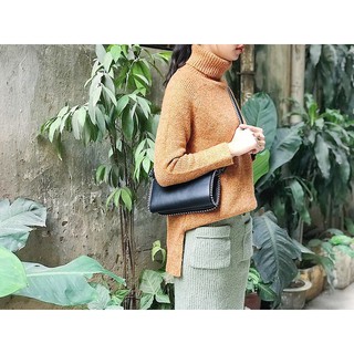 Áo len xẻ tà Tâm Thanh Dư