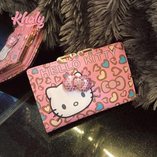 Bóp ví tiền cầm tay nút bật da mềm Hello Kitty beo trái tim và nơ nổi nhiều ngăn màu hồng lợt dành cho nữ và các bạn gái