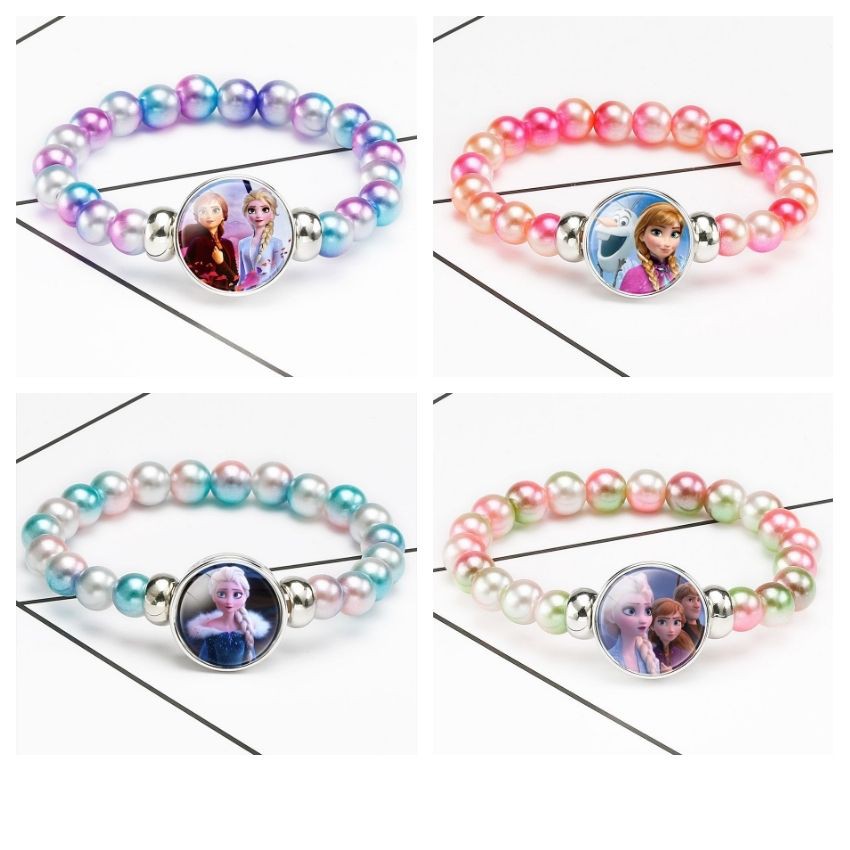 Vòng Tay Elsa hottrend cho bé gái bằng chuỗi hạt nhựa phối mặt kính hình công chúa Elsa.