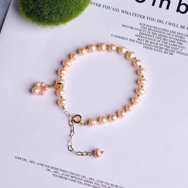 Vòng tay ngọc trai 7ly màu cam mix bi - NT41 - Ngọc Trai Trường Thịnh