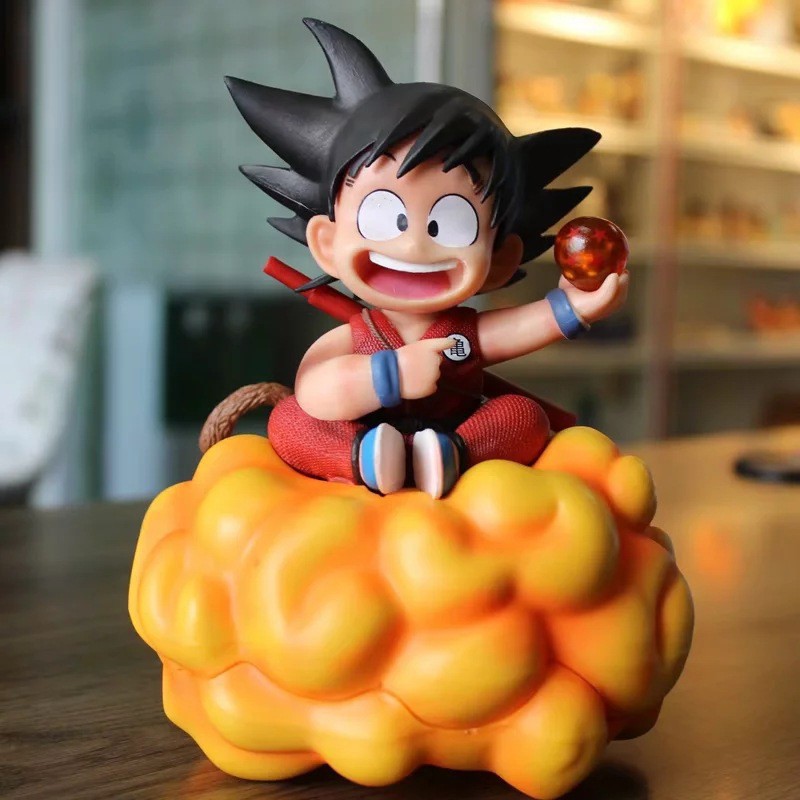 Mô hình Dragonballz Goku Kid ngồi cân đẩu vân tay cầm ngọc rồng