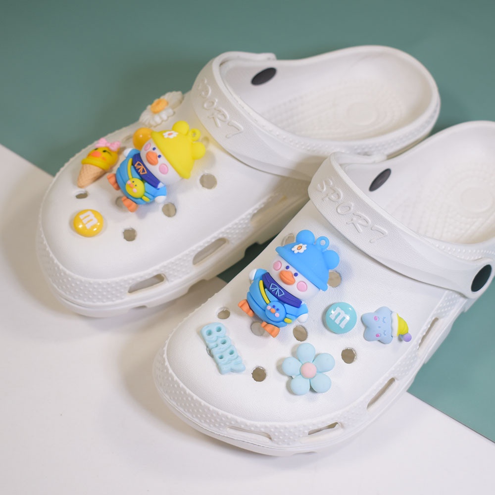 Set 10 Phụ Kiện Gắn Ba Lô / Giày Crocs / Túi Xách Hình Vịt Hoạt Hình Dễ Thương Cho Bé