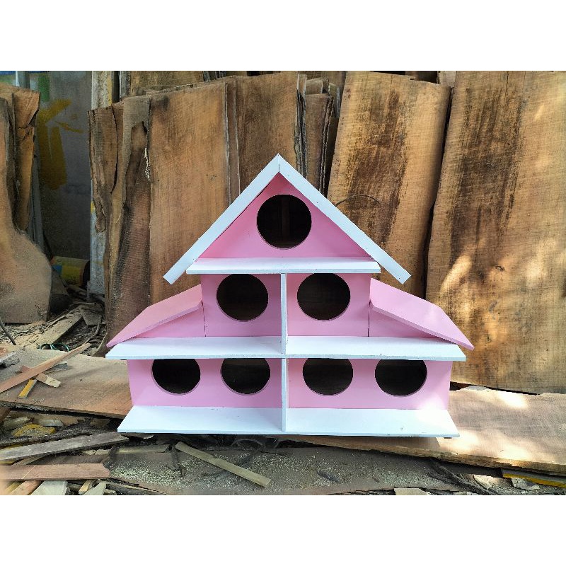 Chuồng bồ câu 7 lỗ tròn sơn màu hồng lang can trắng
