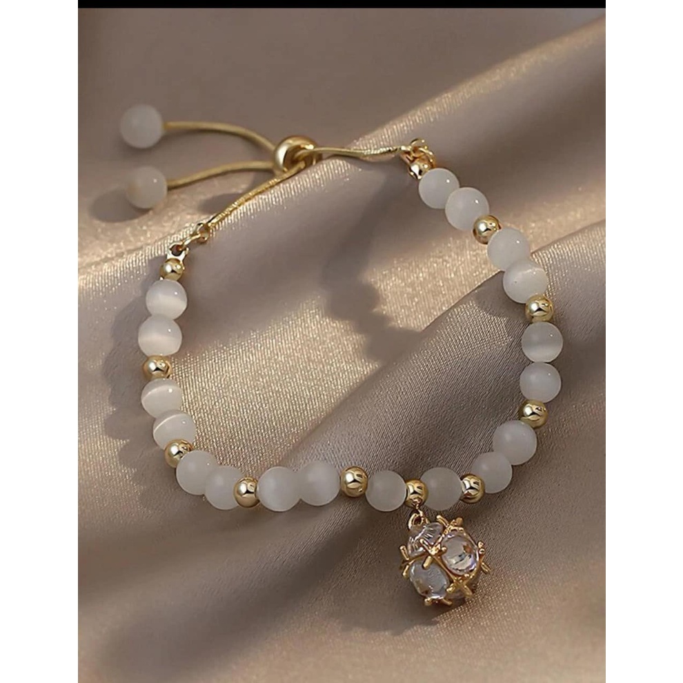 Vòng lắc tay nữ cườm đá Opal rút dây hàng Aut cao cấp