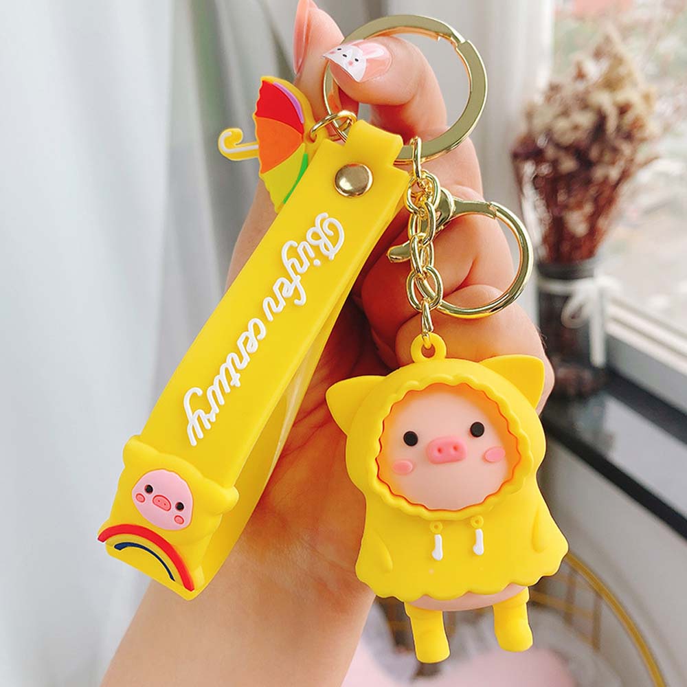 Móc Khóa Hình Chú Heo Mặc Áo Mưa Nhiều Màu Dễ Thương