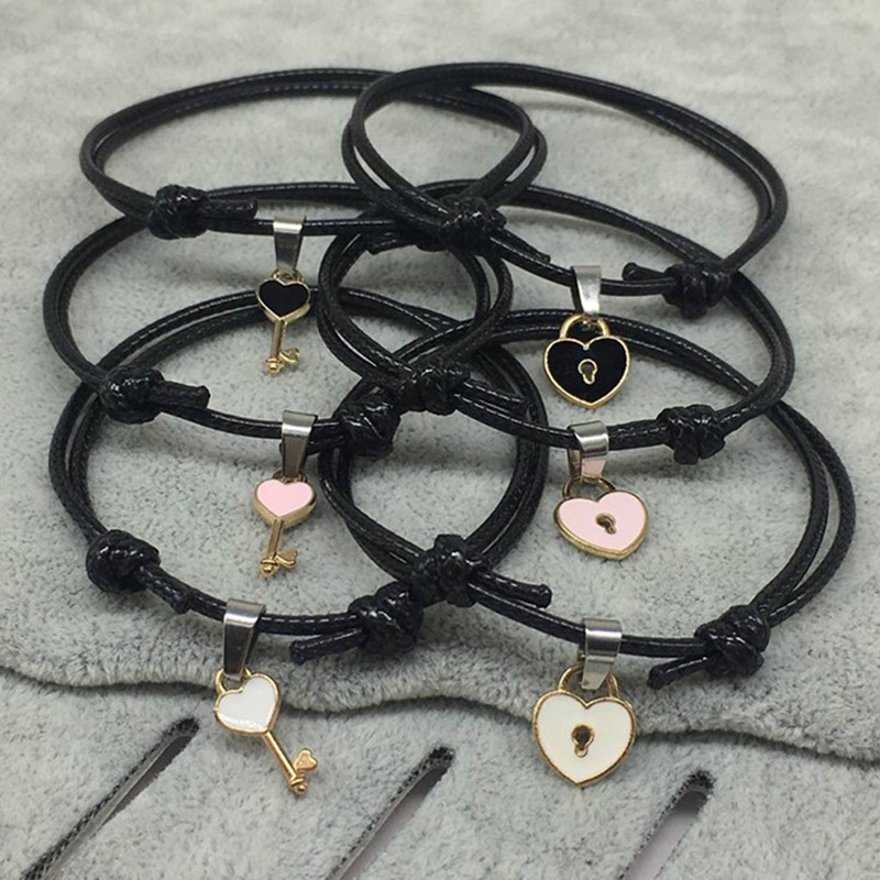 Set 2 vòng tay bện dây mặt kim loại hình trái tim thời trang dễ thương cho cặp đôi