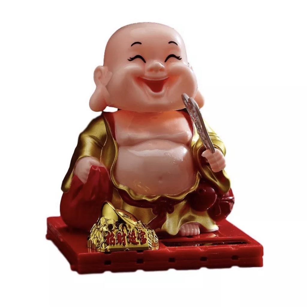Tượng phật di lặc gật đầu, vẫy quạt bằng năng lượng mặt trời
