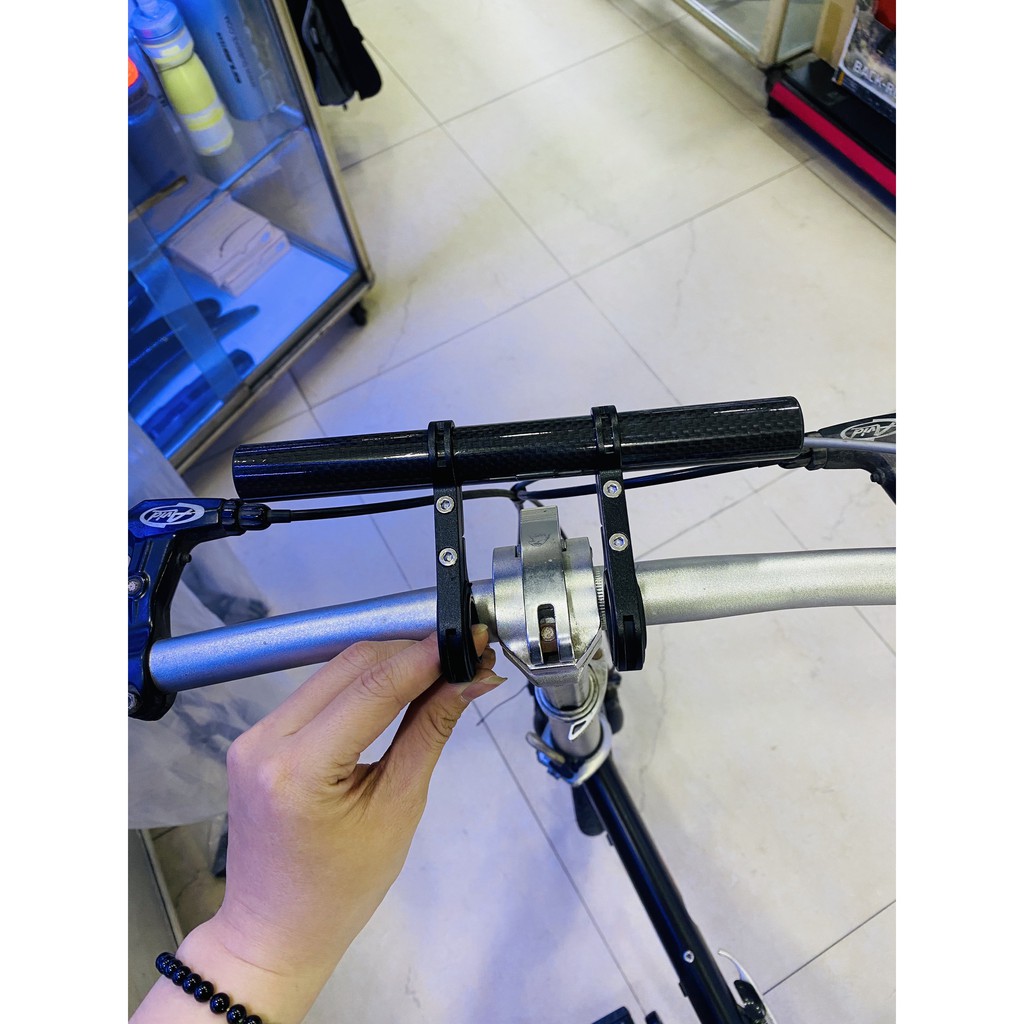 Pát mở rộng gắn đồng hồ - đèn pin trên ghi đông xe đạp HOBE (đen)