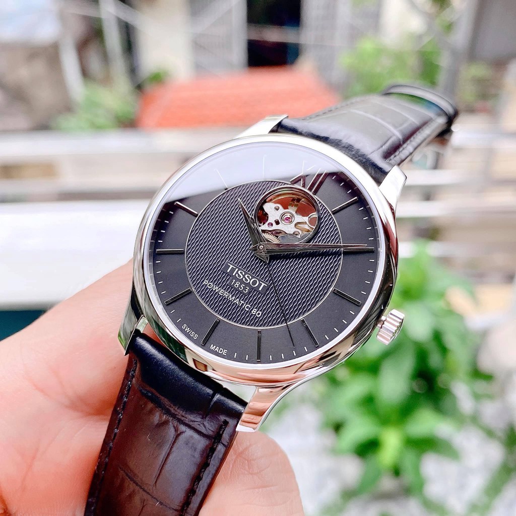 Đồng hồ Nam TissoT 1853 Open Heart/Hở tim T063.907.16.058.00 Mặt đen,Kính Sapphire-Máy cơ tự động-Dây da đen-Size 40mm