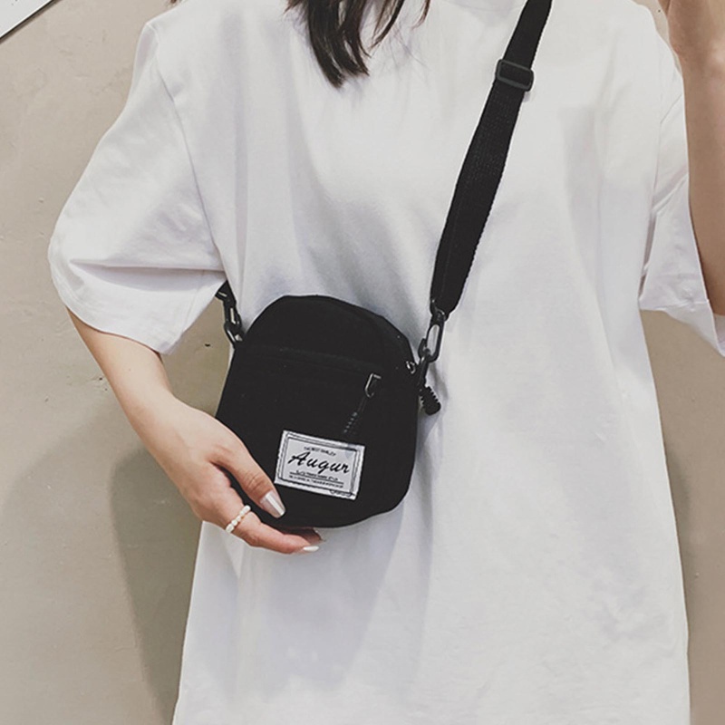 Túi đeo chéo mini bằng vải canvas màu trơn có khóa kéo thời trang dành cho nữ