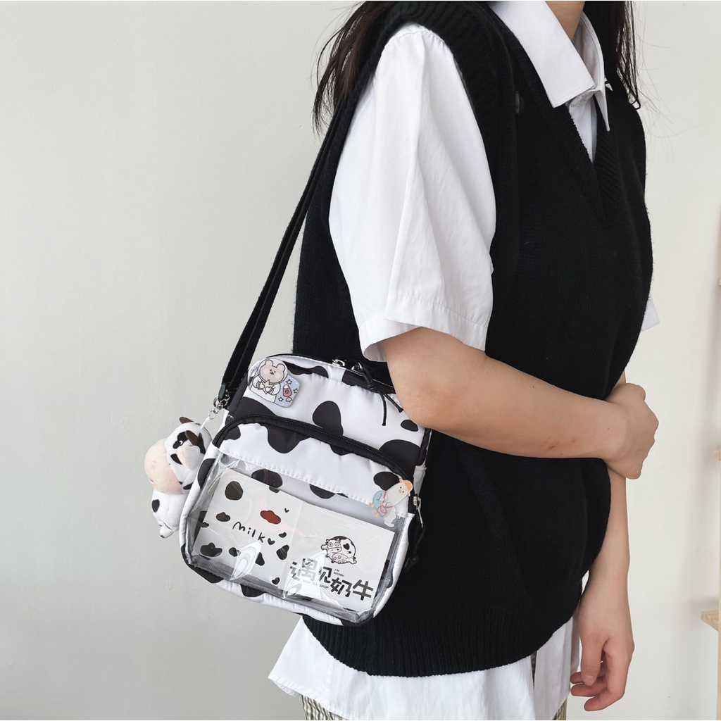 Túi đeo chéo bò sữa