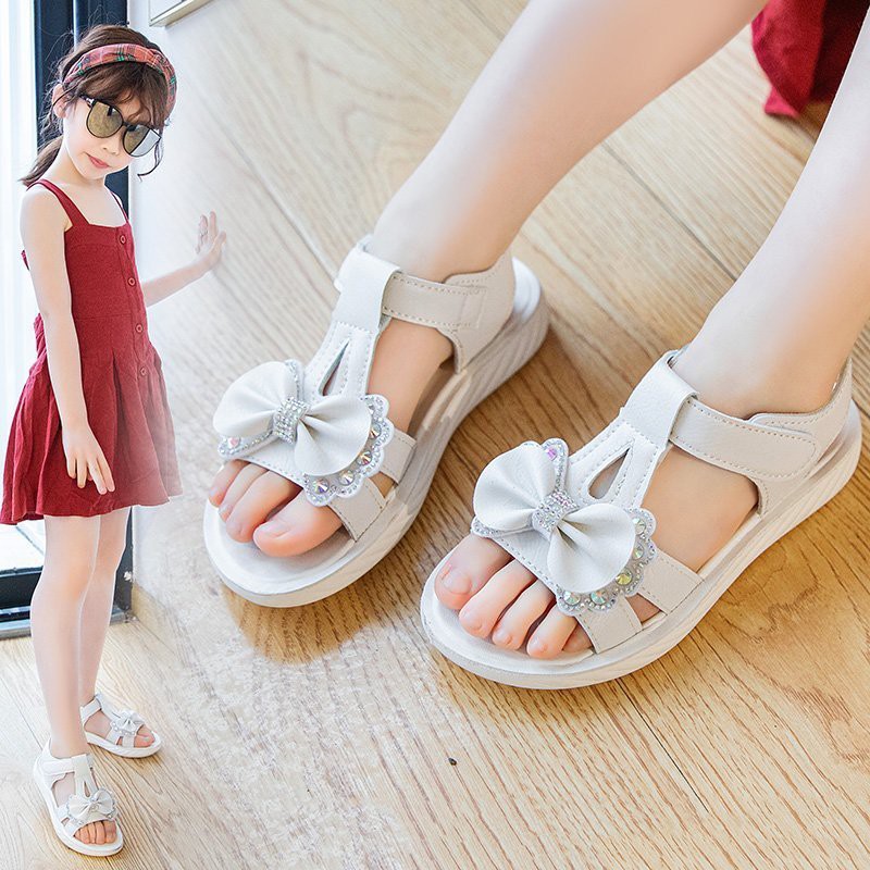 Sandal Bé Gái 2-13 Tuổi Quai Ngang Siêu Nhẹ Đế Êm Chống Trơn Trượt Gắn Nơ Đính Đá Phong Cách Hàn Quốc D36