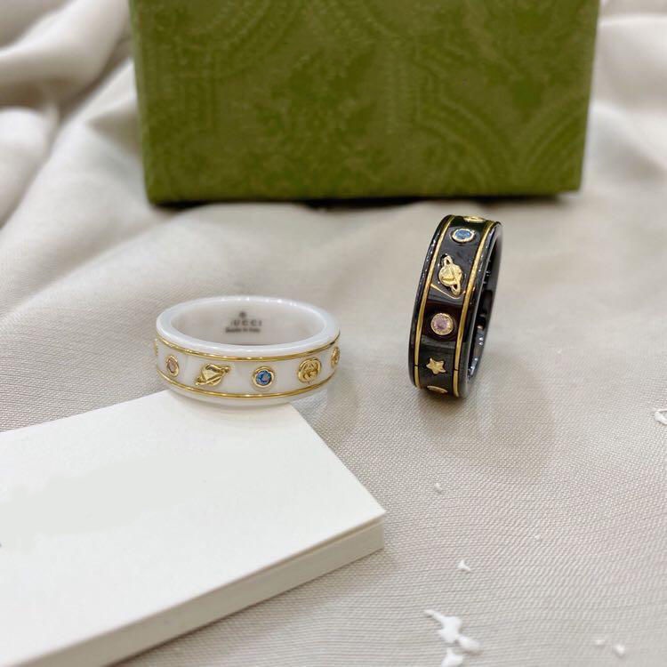 Nhẫn Gucci Họa Tiết Hành Tinh Phối Màu Trắng Đen Cá Tính Cho Cặp Đôi